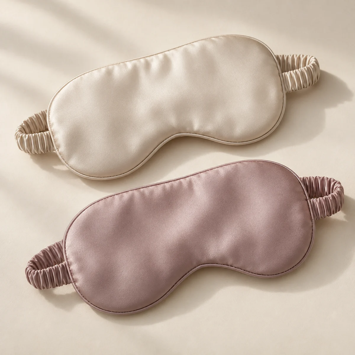 Design direction: ivory and mauve silk sleep masks